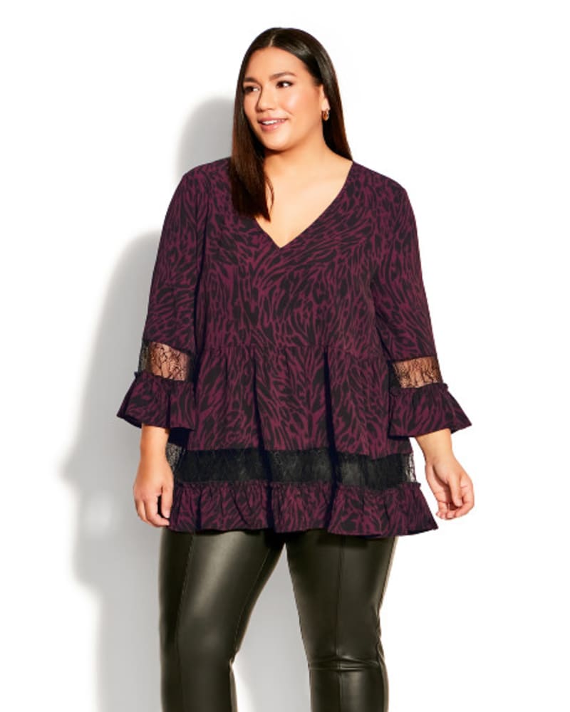 Front of a model wearing a size 26/28 Eden Lace Top in Guilded Tiger by Ave Studio. | dia_product_style_image_id:312042